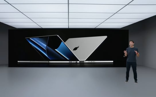 A person standing in front of a large screen

Description automatically generated with low confidence